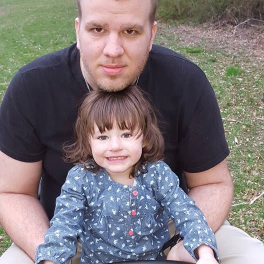 Helping Dad cut grass